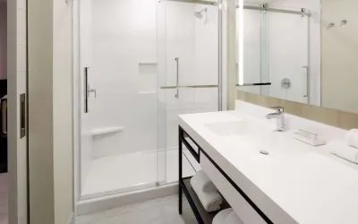 Private bathroom with shower at Hilton Garden Inn Montreal Midtown.