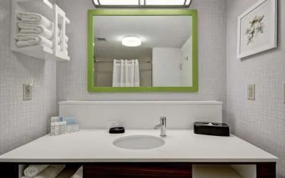 Private bathroom with free toiletries at the  Hampton Inn & Suites By Hilton Guelph.