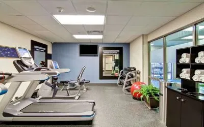 Fully equipped fitness center at the  Hampton Inn & Suites By Hilton Guelph.