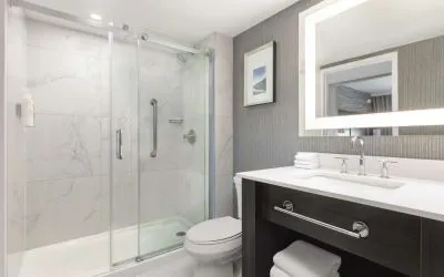 Private guest bathroom with shower at the Embassy Suites By Hilton Toronto Airport.