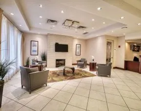 Hotel lobby with lounge area at Amenida Residences.