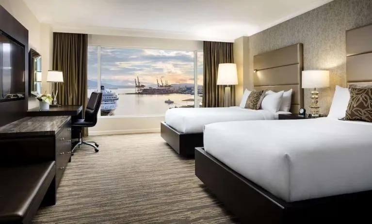 Day use twin room with TV, work desk and private bathroom at the Fairmont Waterfront.