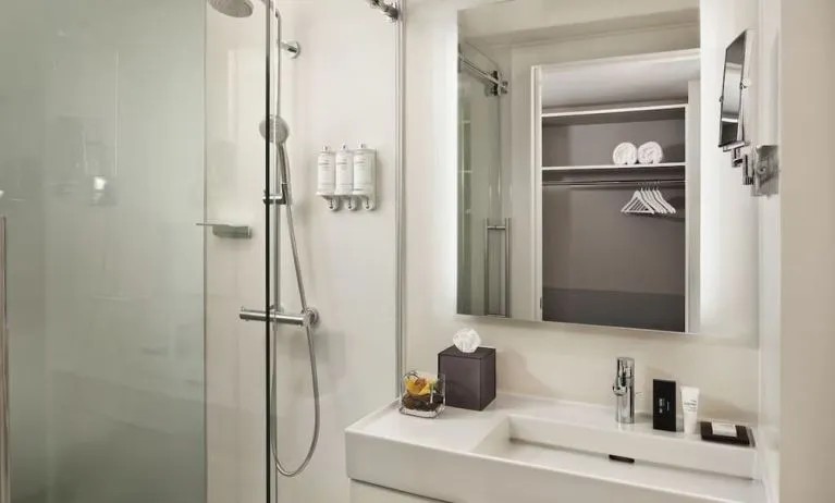 Guest bathroom with shower at Innside By Melia New York Nomad.