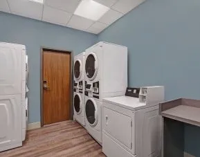 Laundry room at Holiday Inn Express Kingston West.