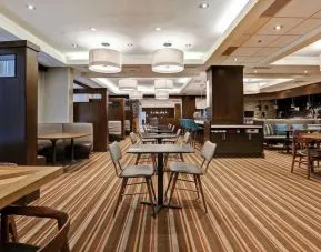Dining area with comfortable seating perfect for co-working at Four Points By Sheraton Toronto Mississauga.