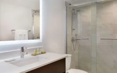 Private guest bathroom at DoubleTree By Hilton Hotel Toronto Airport West.