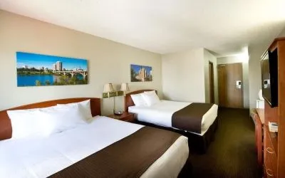 Day use twin room with TV, work desk and private bathroom at Riviera Motor Inn.