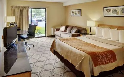 Day use room with TV, sofa, work desk and private bathroom at Comfort Inn Yarmouth.