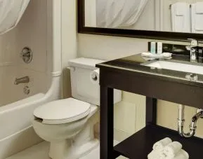 Guest bathroom with tub at Comfort Inn Yarmouth.