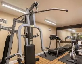 Fitness center at Coratel Plus Suites Wichita West Airport.