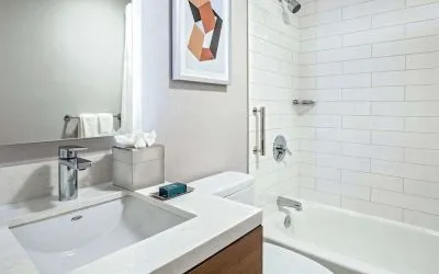 Guest bathroom with shower and tub at DoubleTree By Hilton Westborough.