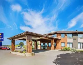 Hotel entrance and parking area at Comfort Inn Amherst.