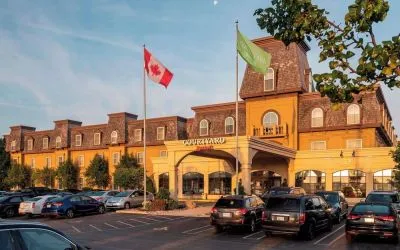 Hotel entrance and parking area at Courtyard By Marriott Waterloo St. Jacobs.