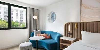 Day use room with lounge area at Sonesta Miami Airport.