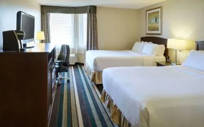 Bright and spacious day use twin room with work desk and private bathroom at Holiday Inn Conference Center Edmonton South.