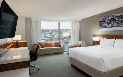 Day use room with sofas and work desk at Delta St. John's Hotel & Conference Center.