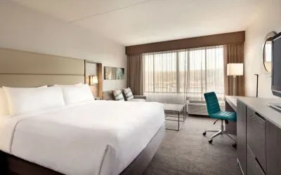 Day use room with work desk and sofa at Crowne Plaza Englewood.