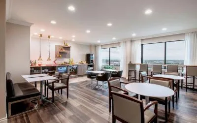 Dining area with comfortable seating at Delta Hotel By Marriott Regina.
