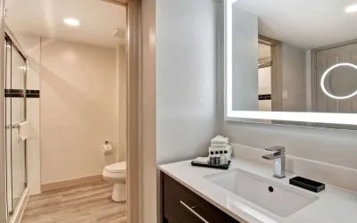 Guest bathroom with shower and free toiletries at The Park Hotel London.