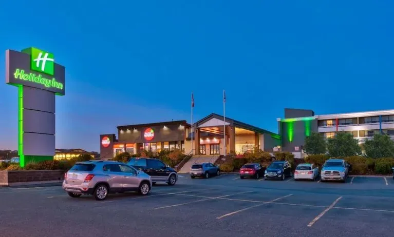 Hotel exterior and parking area at Holiday Inn St. John's Conference Centre.