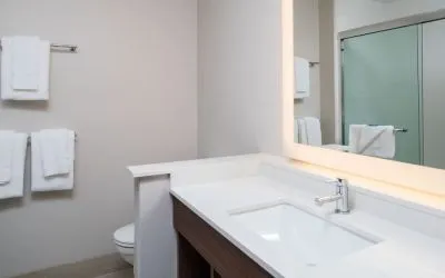 Guest bathroom with shower at Holiday Inn Express & Suites Ruston.