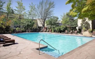 Refreshing outdoor pool at Hilton Seattle Airport & Conference Center.