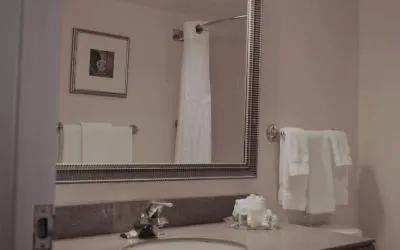 Guest bathroom with shower and free toiletries at Holiday Inn Laval Montreal.