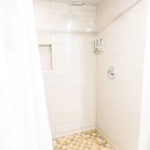 Guest bathroom with shower at Hotel Current.