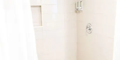 Guest bathroom with shower at Hotel Current.