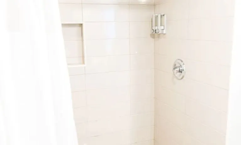 Guest bathroom with shower at Hotel Current.