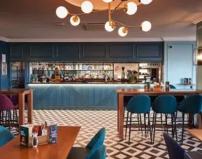 Hotel bar with lounge sitting at Thistle London Heathrow Terminal 5.
