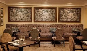 Dining area with comfortable seating at The Royal Horseguards Hotel.