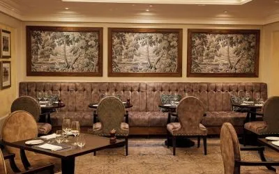 Dining area with comfortable seating at The Royal Horseguards Hotel.