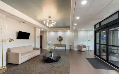 Lobby and coworking lounge at Best Western Executive Hotel Of New Haven-West Haven.