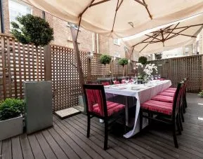 Outdoor patio at Mercure Hotel London Hyde Park.