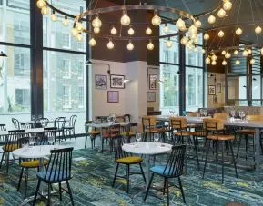 Dining area at Leonardo Royal Hotel London Tower Bridge.