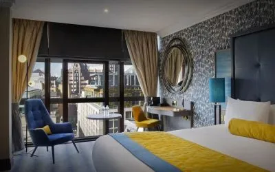 Day use room with work desk at Leonardo Royal Hotel London City.