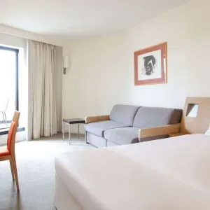 Day use superior room with work desk and living area at Novotel Manchester West.