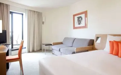Day use superior room with work desk and living area at Novotel Manchester West.
