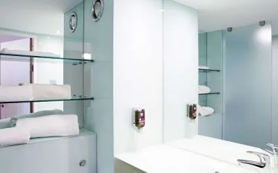 Guest bathroom with shower and free toiletries at Ibis Styles Barnsley.
