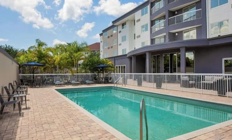 Refreshing outdoor pool at Courtyard By Marriott Tampa Oldsmar.