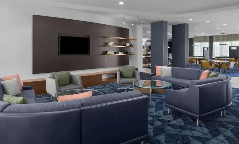 Lobby and coworking lounge at Courtyard By Marriott Tampa Oldsmar.