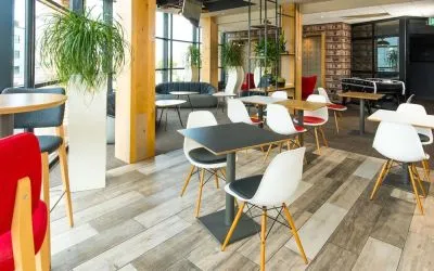 Comfortable lounge area with natural light at ibis Leicester City.