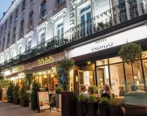 Outdoor seating area at Indigo London-Paddington Hotel.