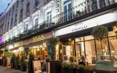 Outdoor seating area at Indigo London-Paddington Hotel.