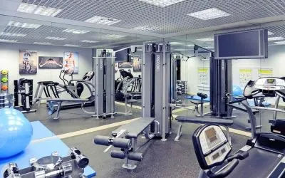 Fully equipped fitness center at Mercure London Paddington Hotel.