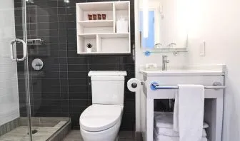 Guest bathroom with shower at Edge Hotel NYC.