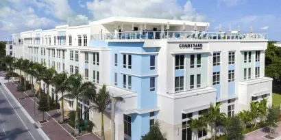 Hotel exterior at Courtyard Delray Beach.
