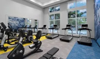 Fitness center at Courtyard Delray Beach.
