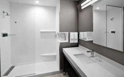 Guest bathroom with shower at Courtyard Delray Beach.
